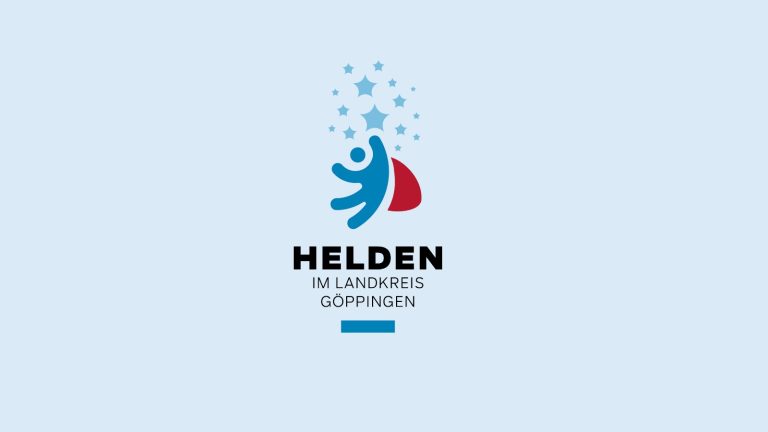 Logo der Heldenwahl Göppingen 2025 – stilisierte Figur mit rotem Cape und aufsteigenden Sternen auf hellblauem Hintergrund.