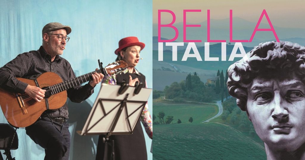 „Bella Italia“ im Rahmen des Kulturhalle Süßen Veranstaltungsprogramms 2025/2026: Sängerin und Gitarrist auf der Bühne, daneben Plakat mit Landschaft und David-Statue.